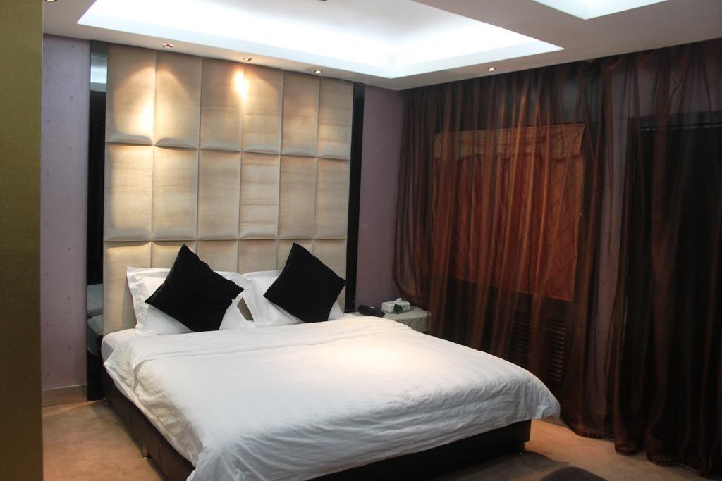 Harbin Yakelai Holiday Hotel Quarto foto
